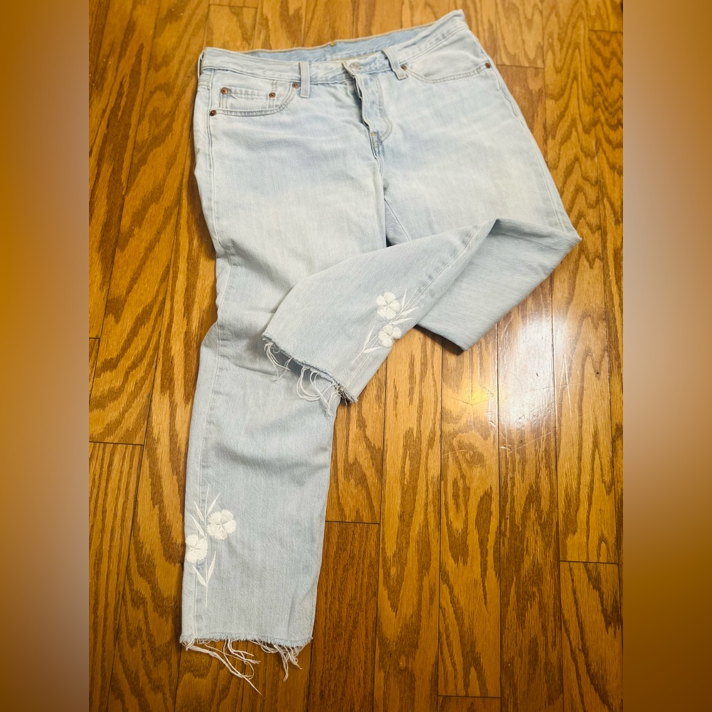 Levi's 501 floral embroidered jeans.